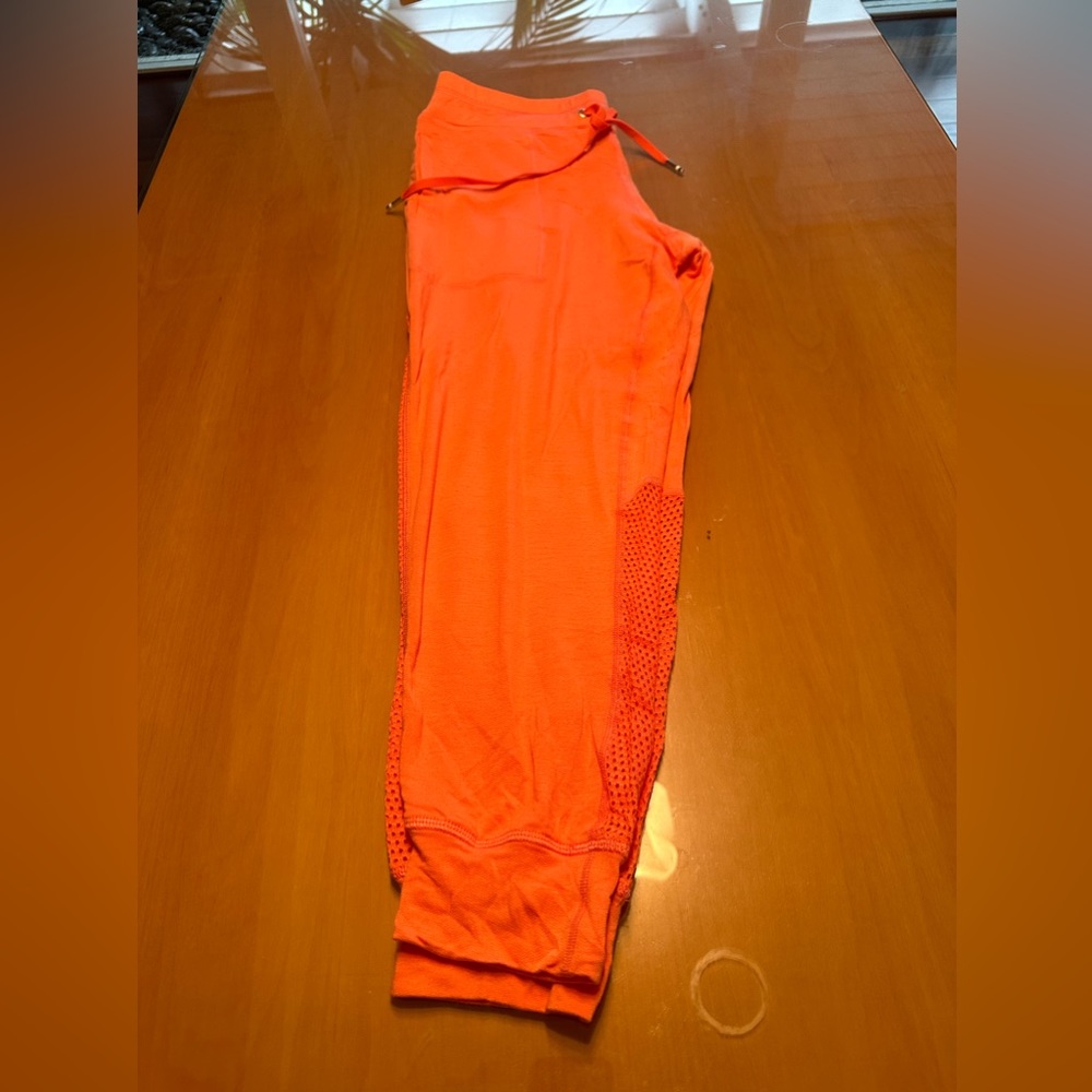 ALALA tangerine size medium joggers